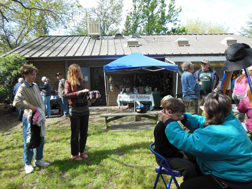 Face painting and other fun for the kids (small and tall). The RTP booth is in the back.